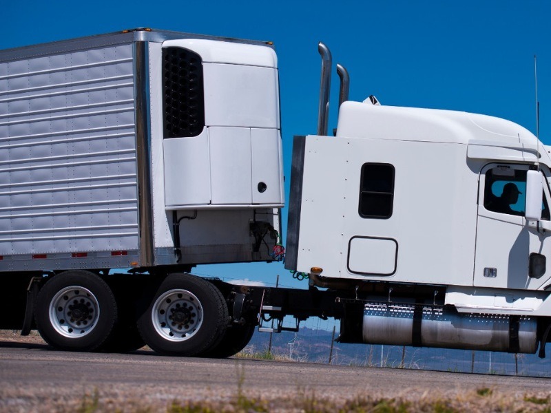 Refrigerated semi-truck transporting perishable goods